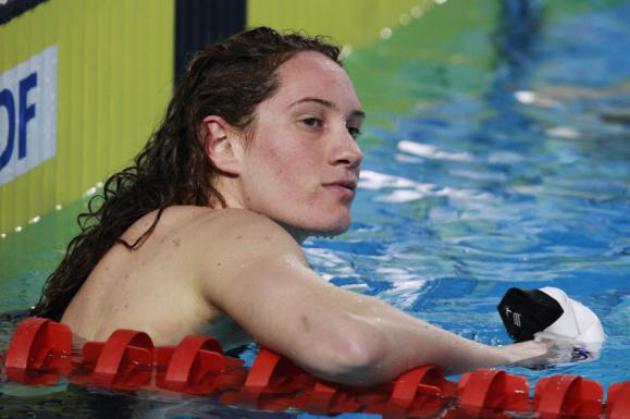 France's Camille Muffat reacts after winning her women's 200 metres freestyle semi-final and qualifying for 2012 London Olympics at the French Swimming Championships in Dunkerque, northern France in this March 20, 2012 file photo. French President Francois Hollande's office confirmed on March 10, 2015 that eight French nationals were among 10 killed in an accident involving two helicopters in Argentina. The Elysee Palace said in a statement that famed sailor Florence Arthaud, Olympic swimmer Muffat and boxer Alexis Vastine were among the dead. It added that the accident happened during the filming of a TV programme for the TF1 TV channel. (REUTERS/Pascal Rossignol)